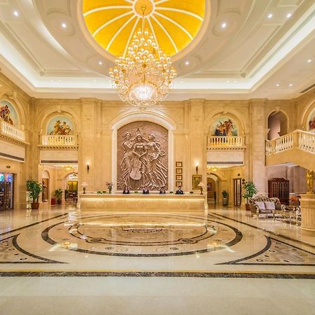 Vienna International Hotel Yantai Changjiang Road Xingyi Square Branch Esterno foto
