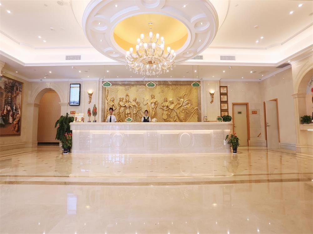 Vienna International Hotel Yantai Changjiang Road Xingyi Square Branch Esterno foto