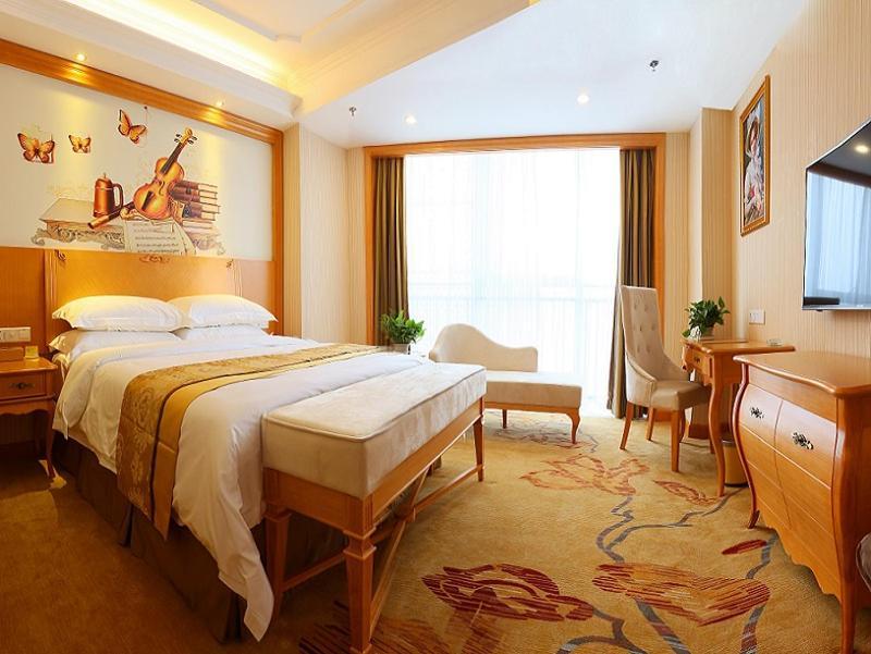 Vienna International Hotel Yantai Changjiang Road Xingyi Square Branch Esterno foto