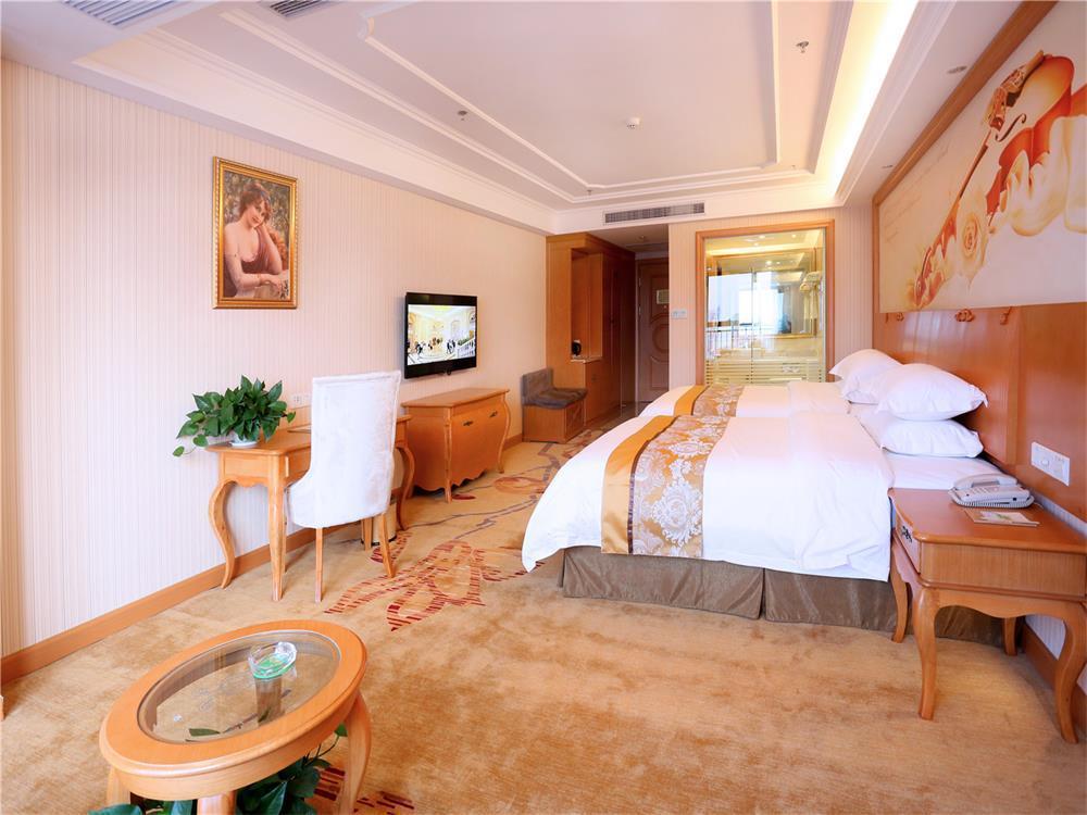 Vienna International Hotel Yantai Changjiang Road Xingyi Square Branch Esterno foto
