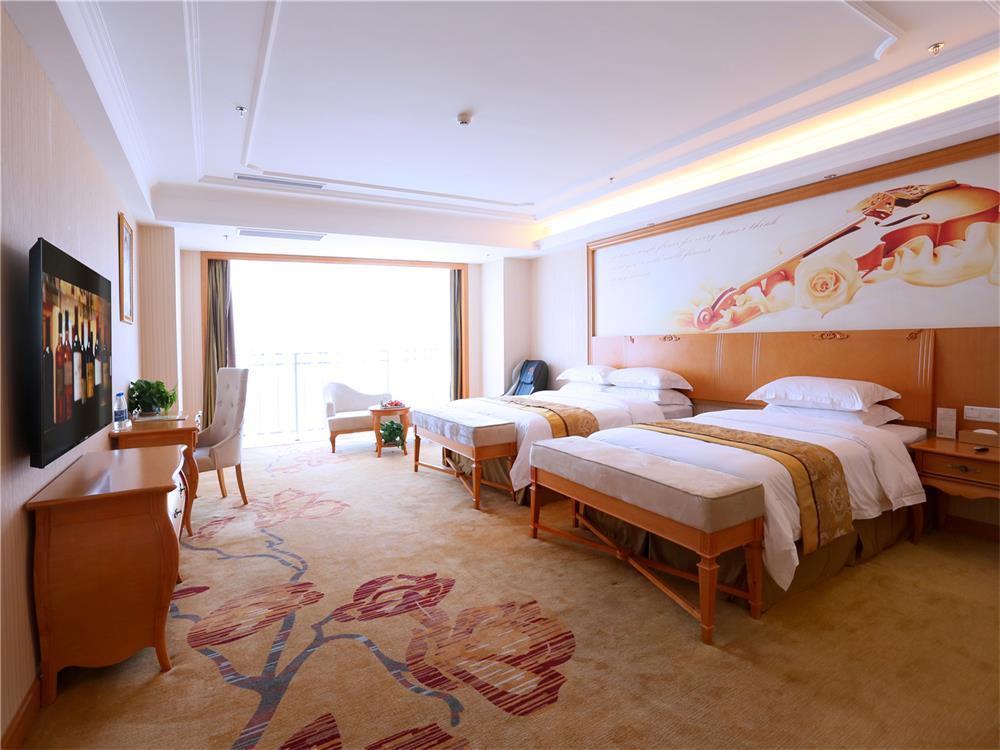 Vienna International Hotel Yantai Changjiang Road Xingyi Square Branch Esterno foto