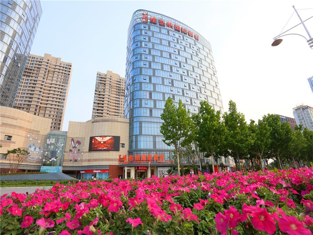 Vienna International Hotel Yantai Changjiang Road Xingyi Square Branch Esterno foto