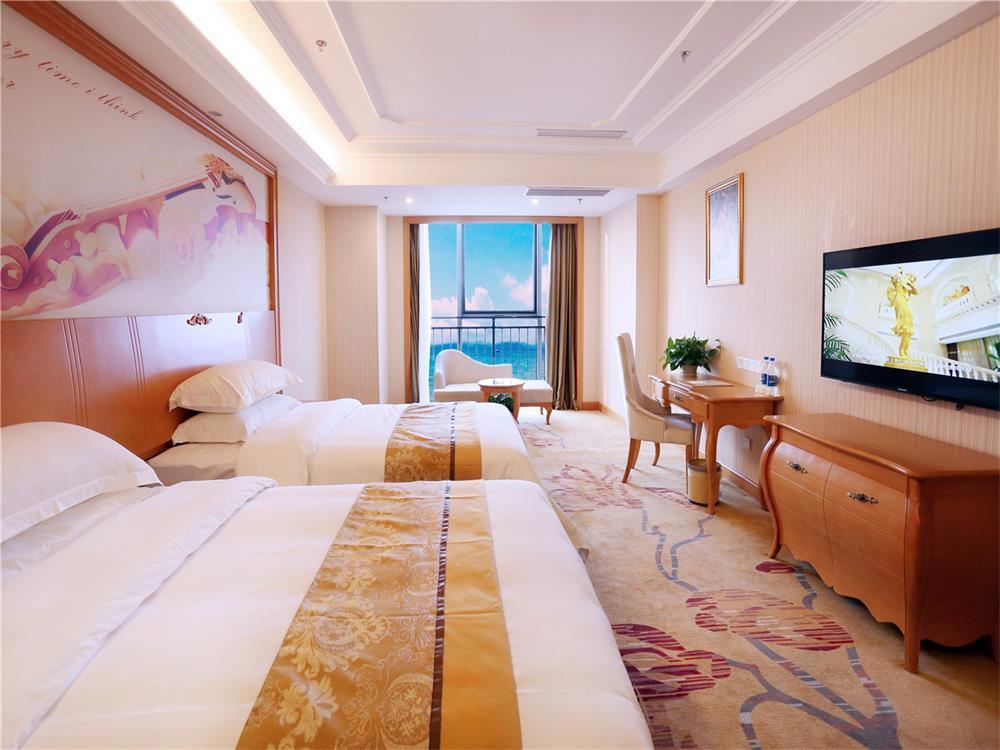 Vienna International Hotel Yantai Changjiang Road Xingyi Square Branch Esterno foto