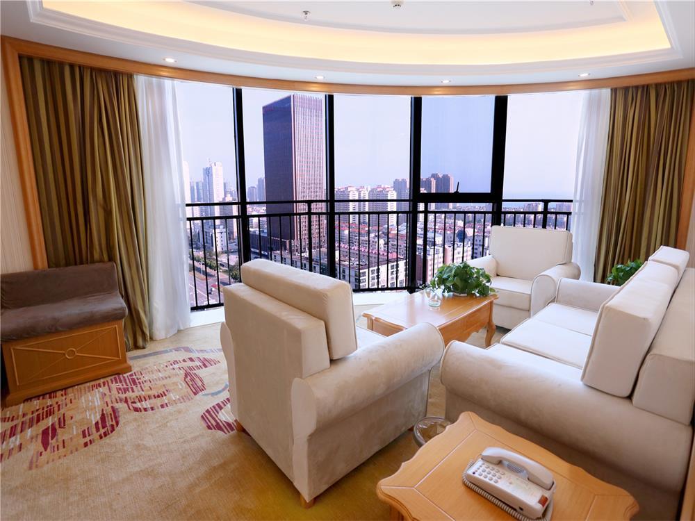 Vienna International Hotel Yantai Changjiang Road Xingyi Square Branch Esterno foto